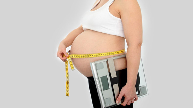 Tăng cân khi mang bầu là một nguyên nhân gây nhức mỏi tay chân 